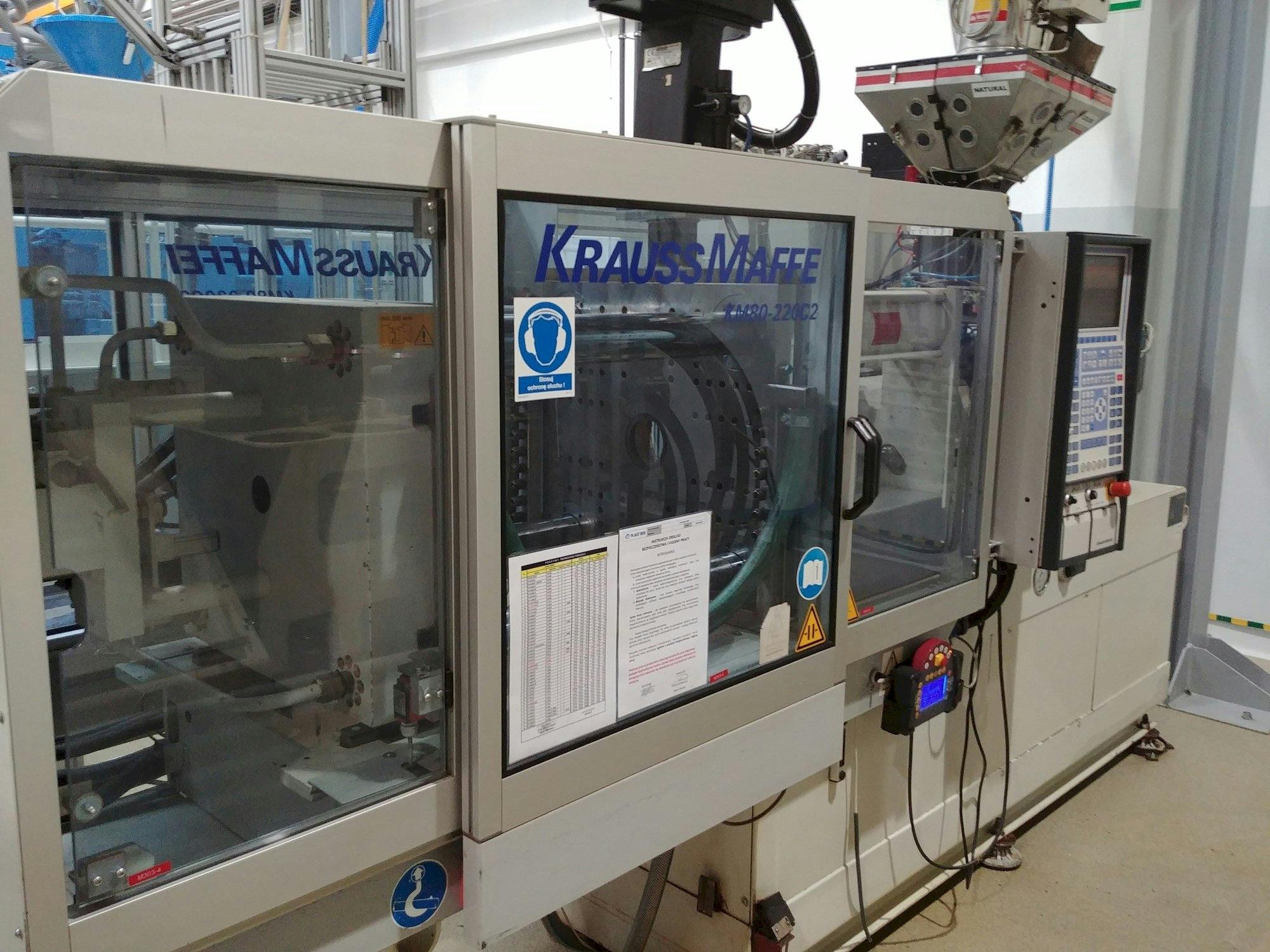 Linke Ansicht der Krauss Maffei KM 80-220 C  Maschine